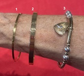 Gold Bracelets, Thin band, thick band, and Heart Charm.